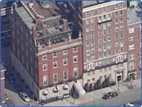 Apartment building next door to Cheers bar