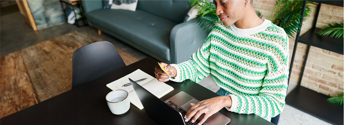 image of woman sitting at desk