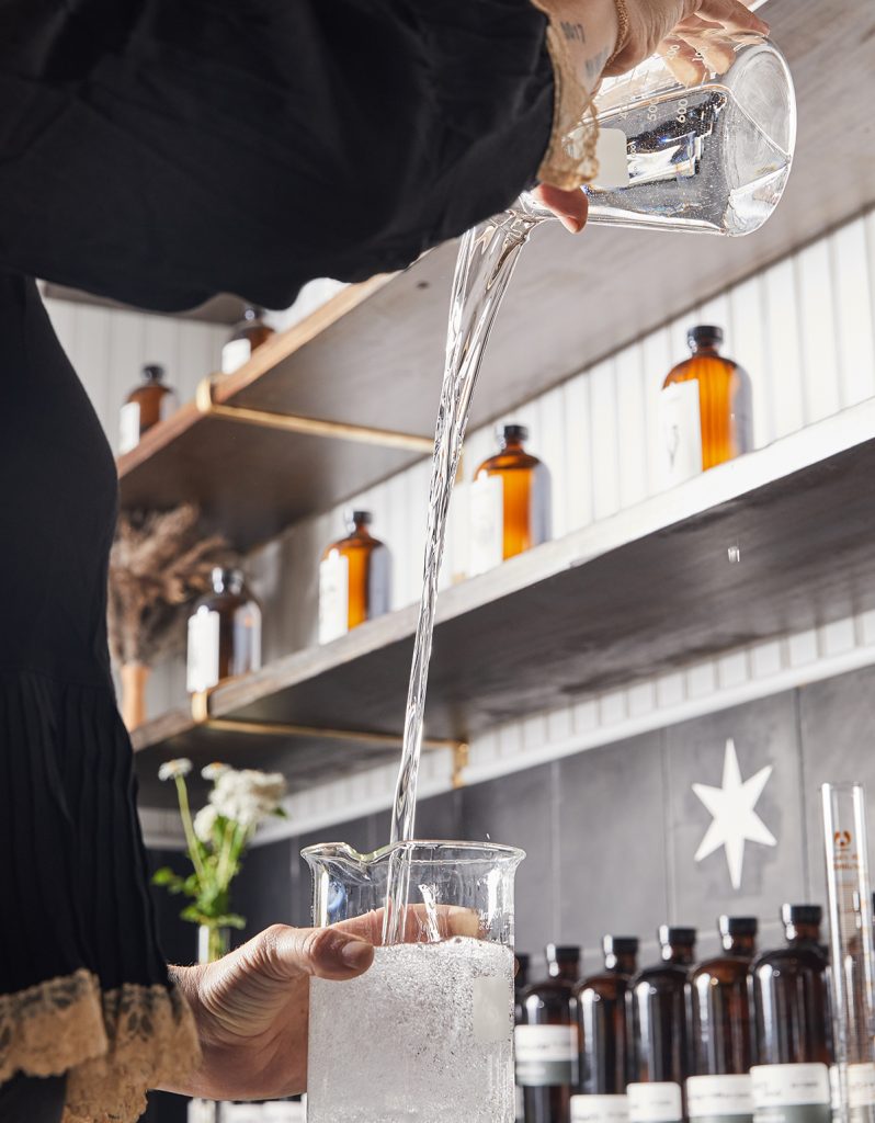 image of pouring drinks at matchbook distilling