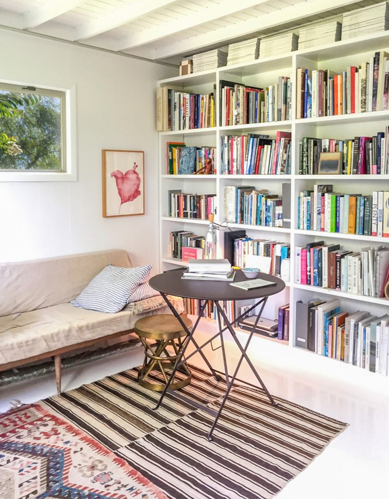image of bookshelf in east hampton springs cottage