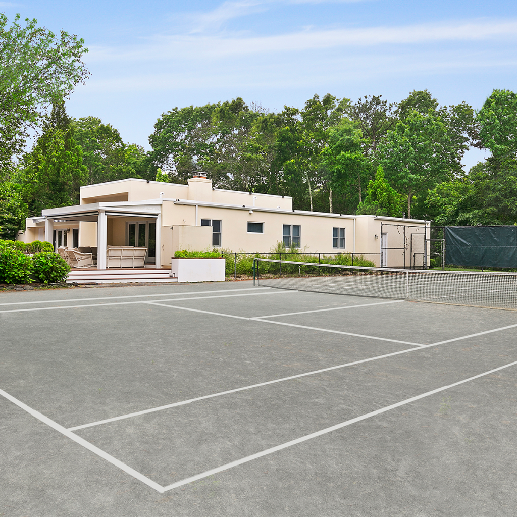A photo of the tennis court at 10 Whippoorwill Ct