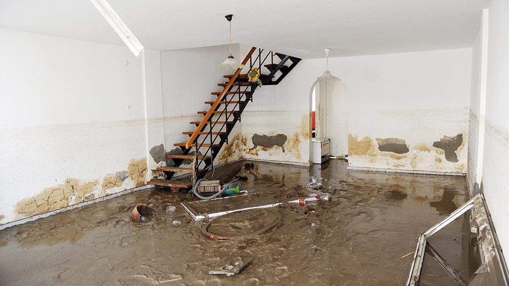 Flooded basement with insurance claim