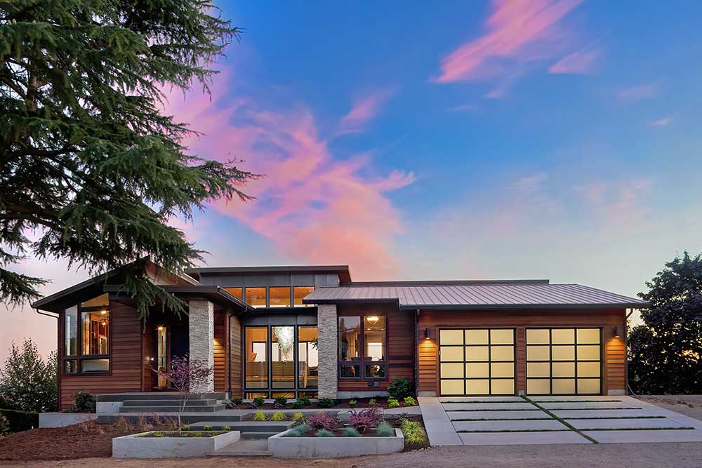 20 percent down payment modern home exterior at sunset