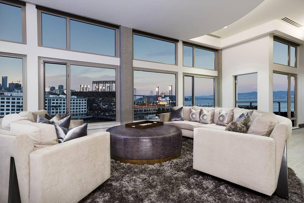 most expensive apartments in America modern living room view of city
