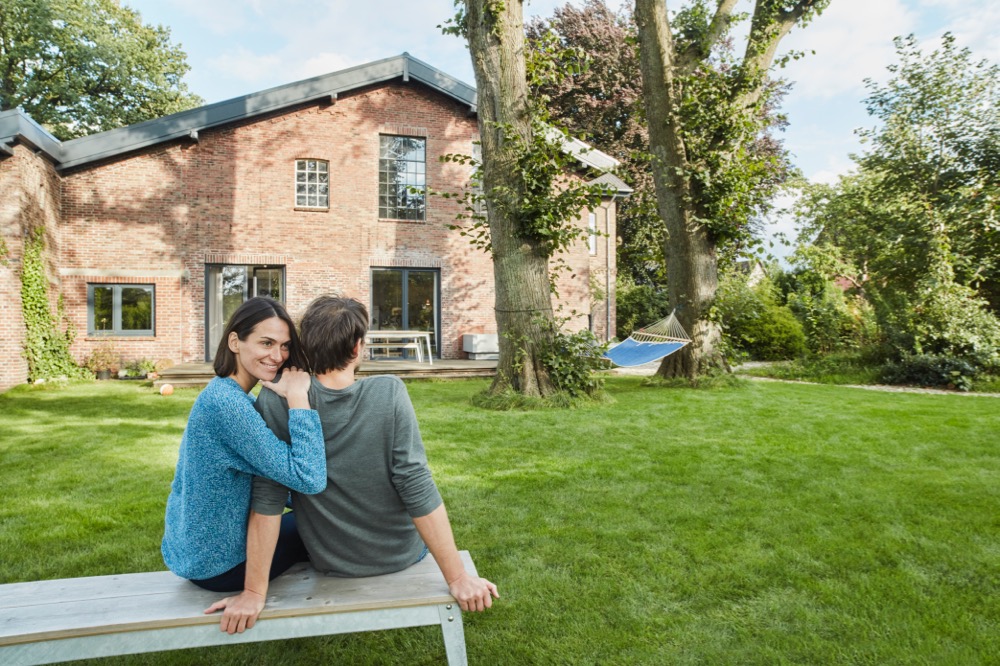 Homeowner couple considering the tax implications of a second home