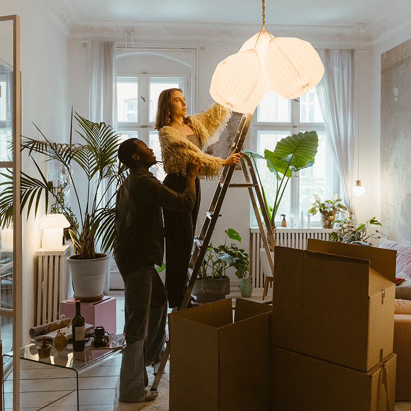 changing lightbulbs in a house