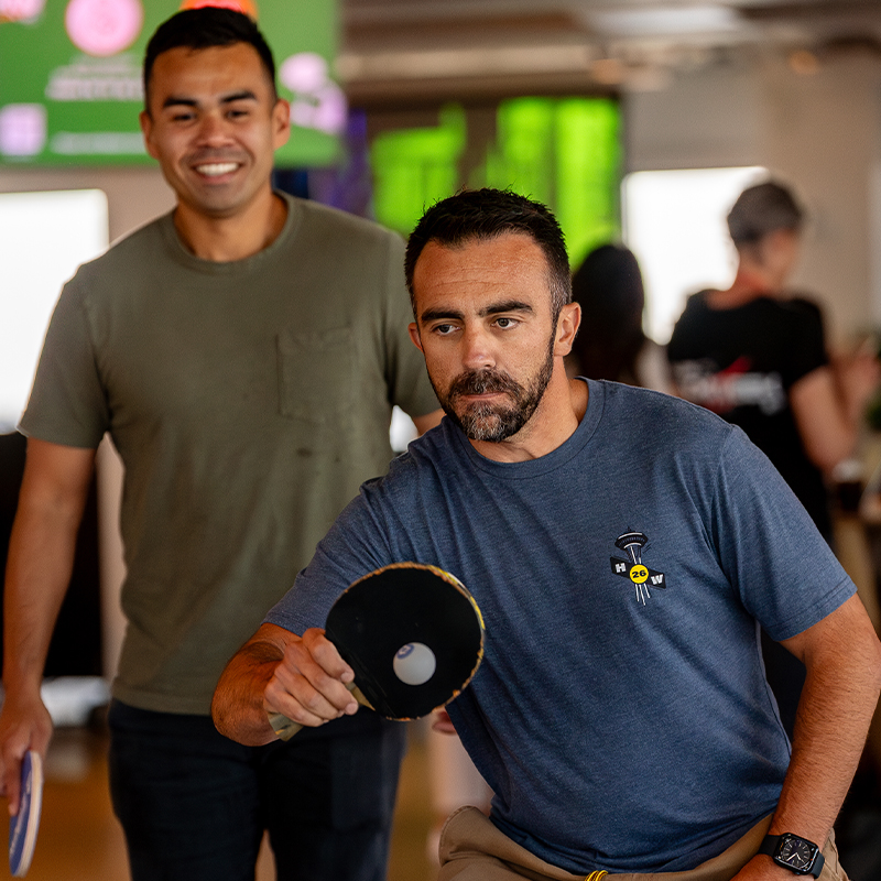 person playing table tennis