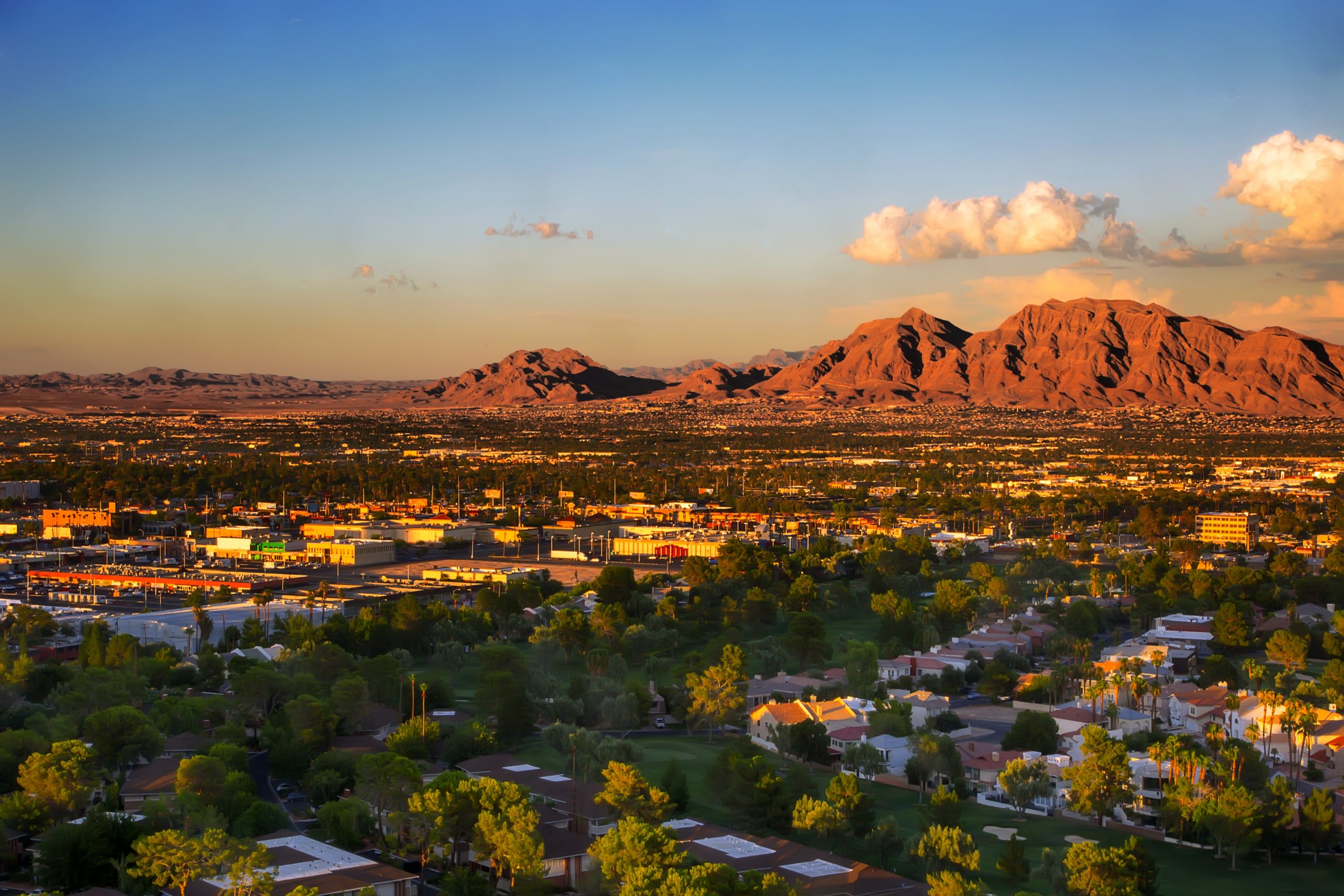 Aerial photo of single family neighborhood in Las Vegas with mountains in the background