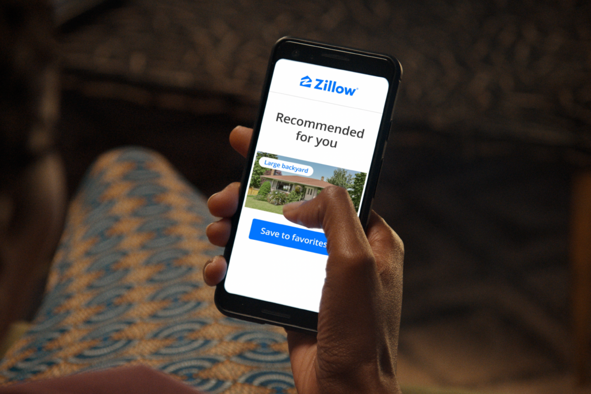 smartphone screen with Zillow home recommendation