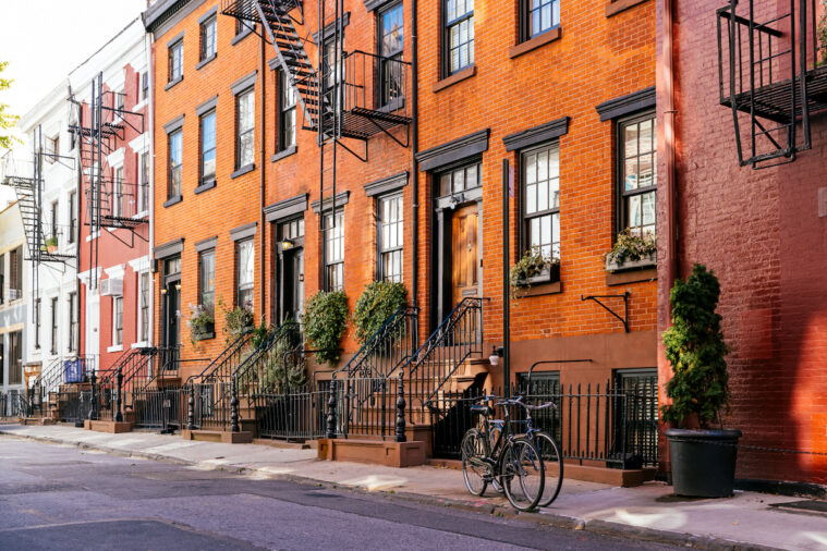 row of NYC townhouses for condo vs. townhouse
