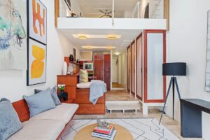 living room with loft in Greenwich Village duplex apartment