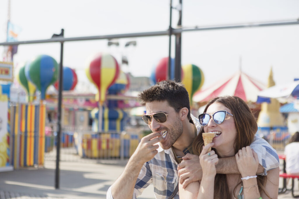 Couple eats ice cream cones in Coney Island - ice cream in NYC