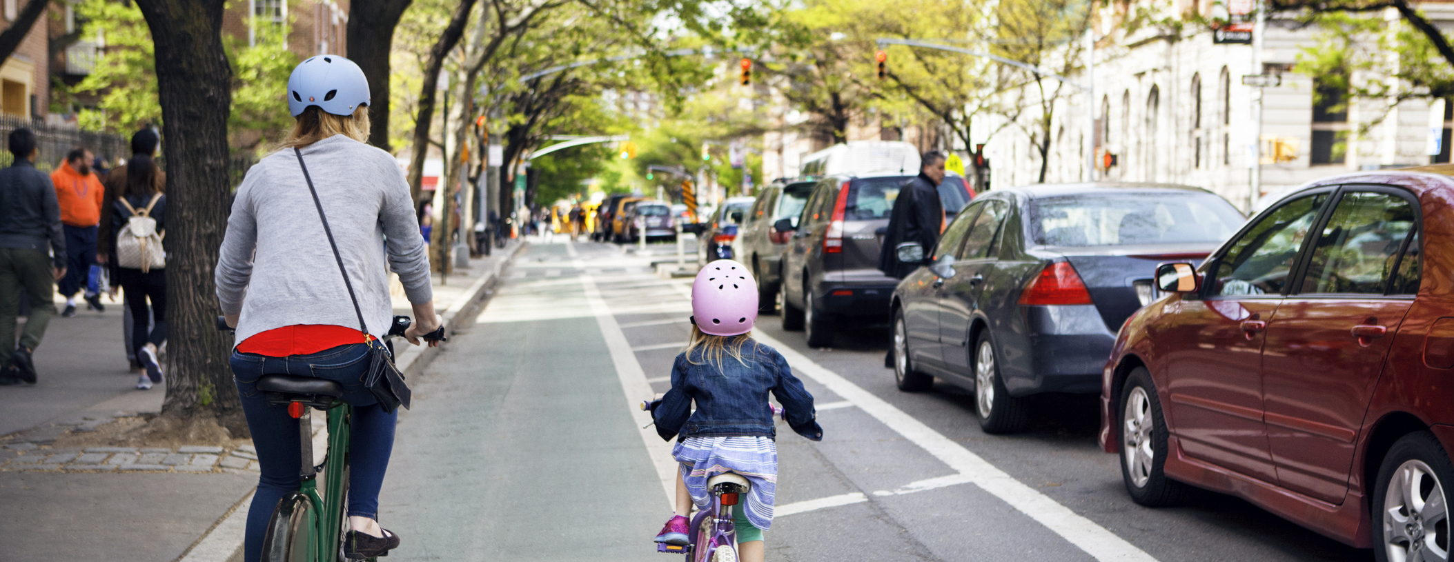 Mom and daughter biking in New York header image