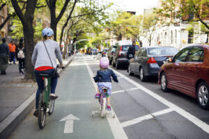 Mom and daughter biking in New York