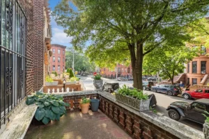 front porch on tree-lined street in Stuyvesant Heights - NYC rentals with private outdoor space