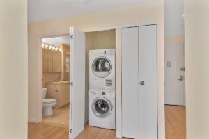 stacked washer-dryer - NYC homes with in-unit laundry