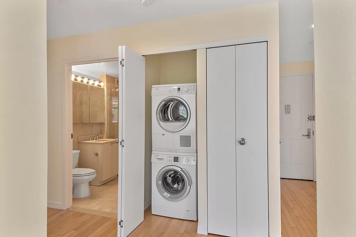 stacked washer-dryer - NYC homes with in-unit laundry
