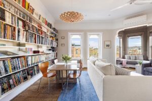 living room with bookshelves in Park Slope 3-bedroom co-op
