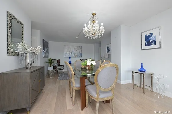 dining room with chandelier in Forest Hills 2-bedroom - NYC homes with private balconies
