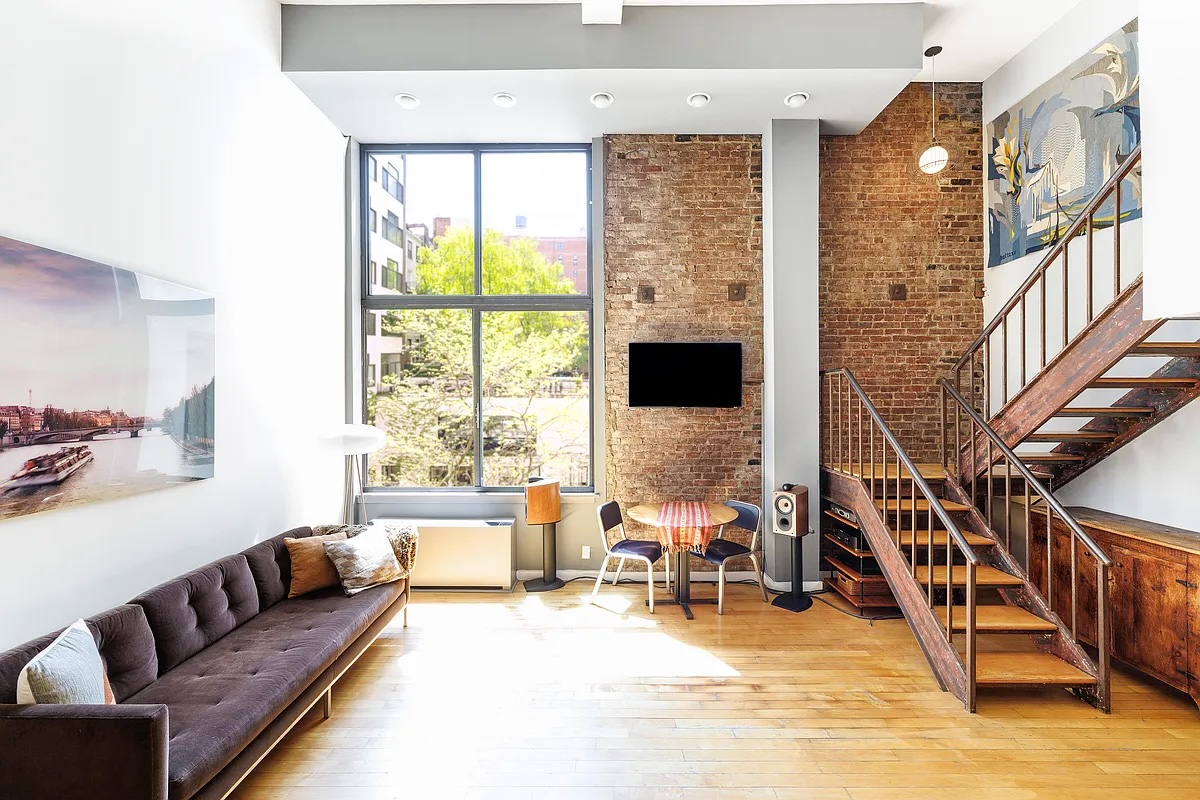 living room and staircase in Greenwich Village duplex loft