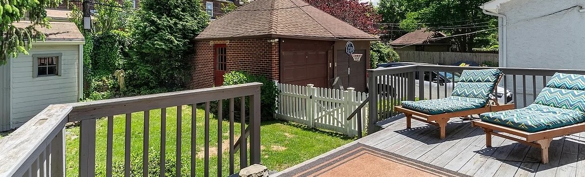 deck and back yard behind Forest Hills single family home - nyc open houses for May 31 and June 1