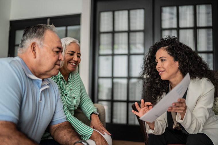 agent meeting with couple at their home - choose a listing agent