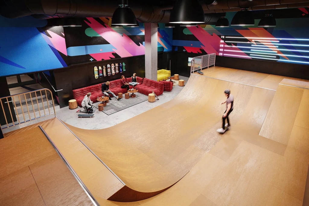 A resident skateboards on the half-pipe at Waterline Square's indoor skate park