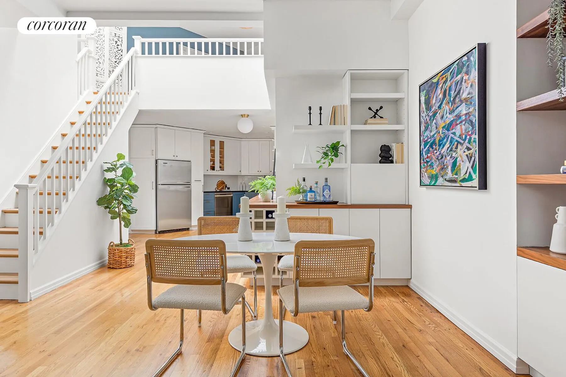 dining room and staircase in Park Slope 2-bedroom duplex