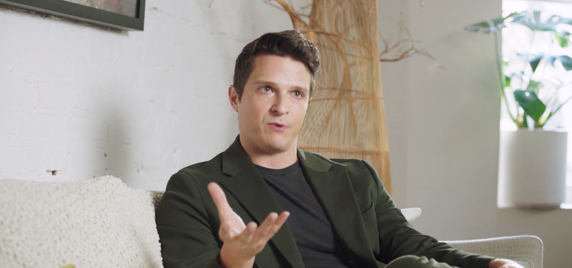 Agent Luke Hoback sitting on a couch - Never DIY the Buy buyer success stories