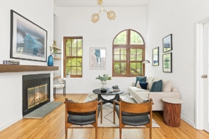 living room with fireplace in Park Slope 2-bedroom duplex