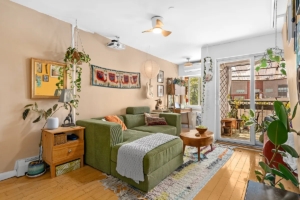 living room with balcony in Ridgewood 2-bedroom duplex