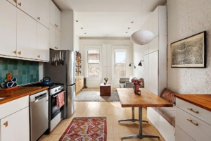 kitchen and living room in 1BR in East Village with in-unit laundry