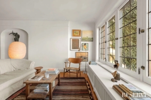 living room with casement windows in charming West Village 2-bedroom