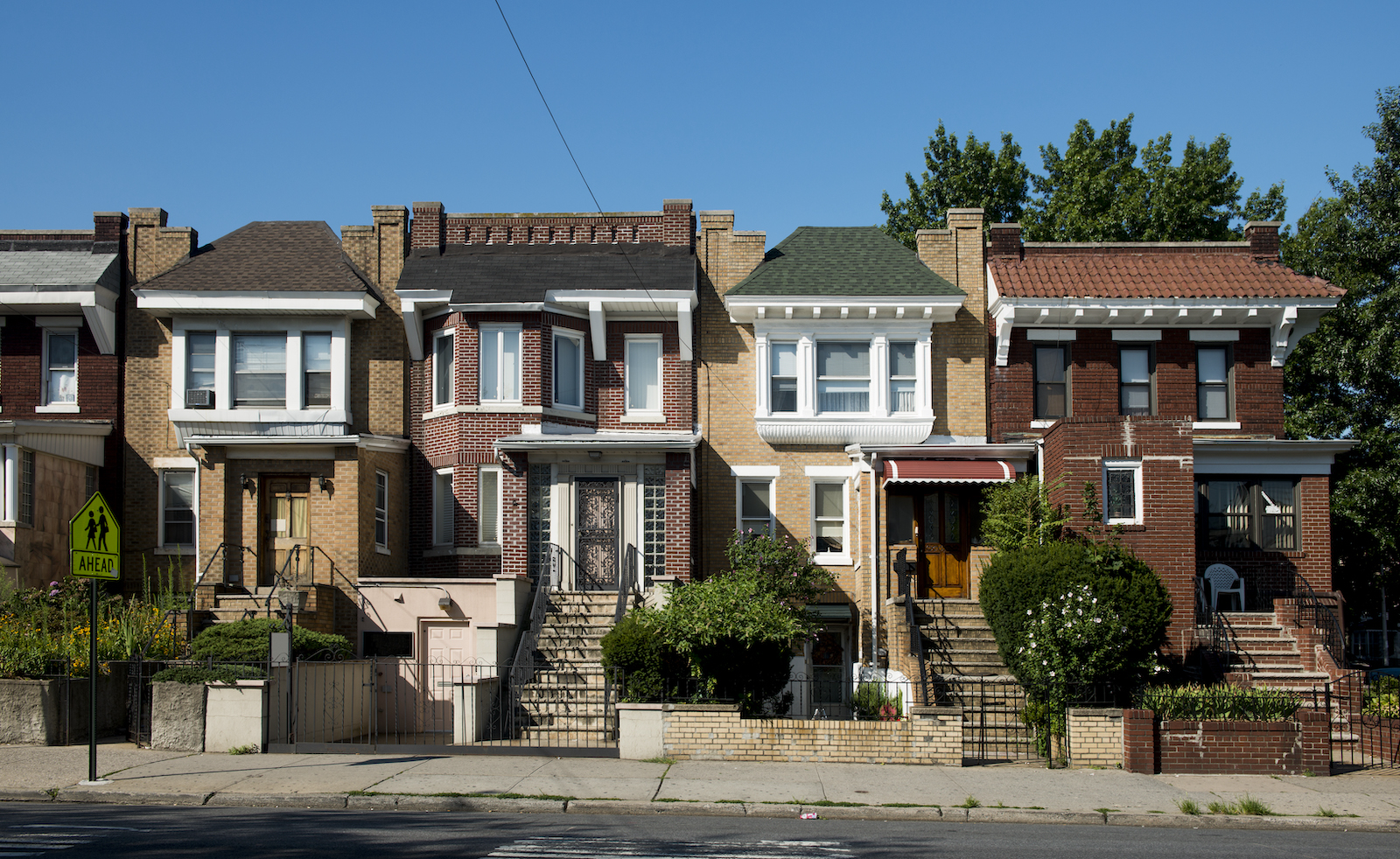 Brooklyn vs. Queens rowhouses in Astoria, Queens