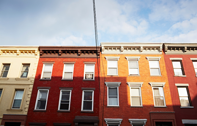 row of buildings New York rent laws