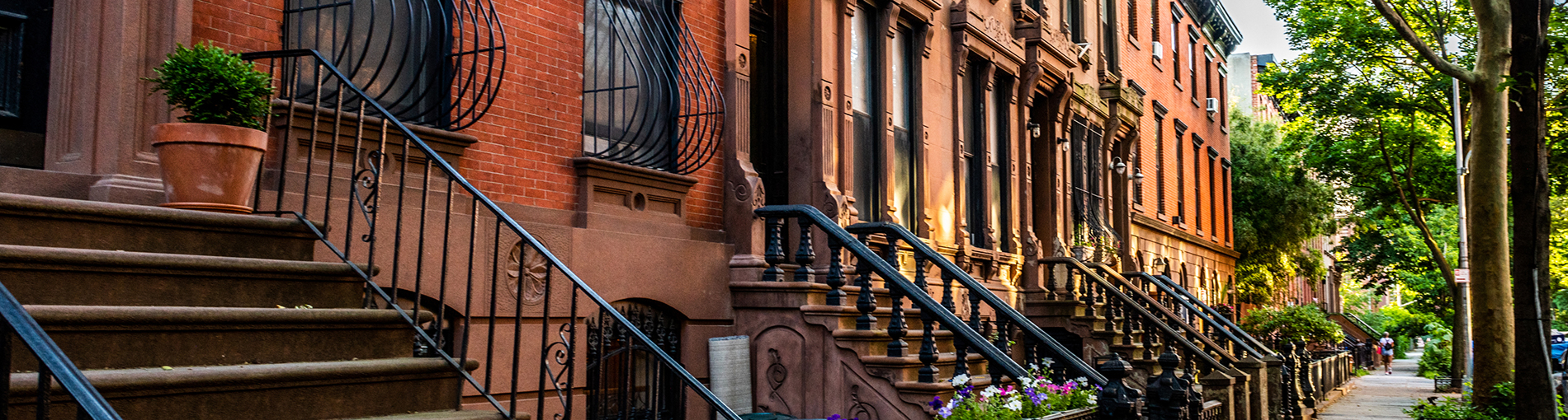 NYC home prices - august 2021 market reports - row of nyc brownstones