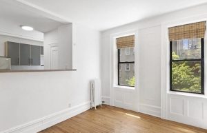 A photo of the living room at 411 West 44th Street #21