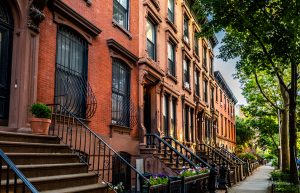 NYC home prices - august 2021 market reports - row of nyc brownstones