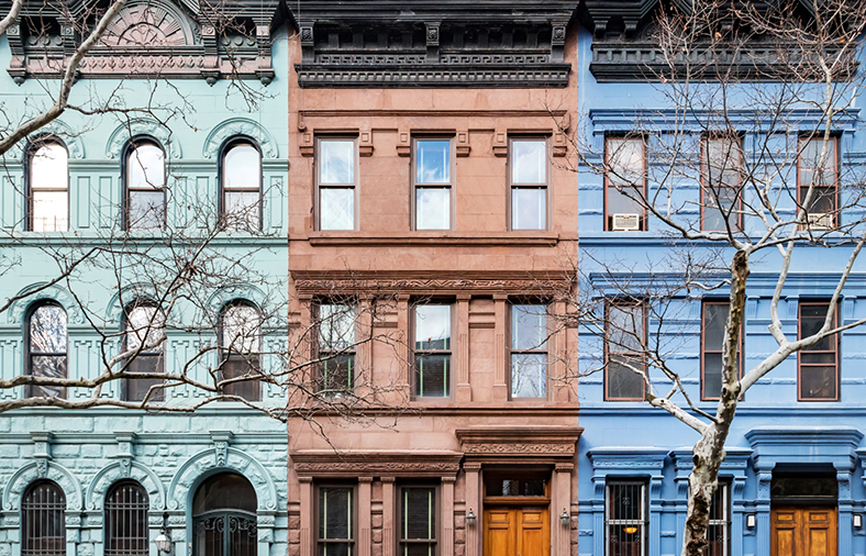 nyc real estate rebound - blog index image - colorful townhouses