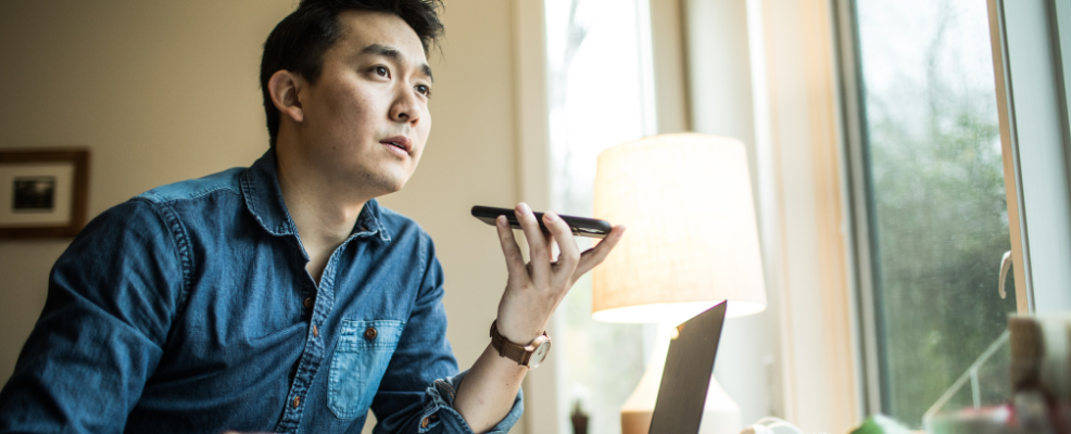 Man talking on phone at home