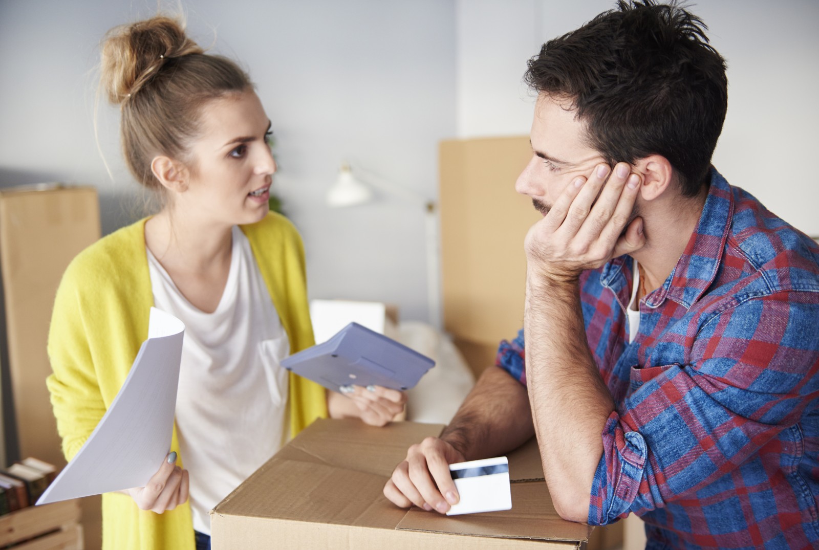 couple bickering over housing stress