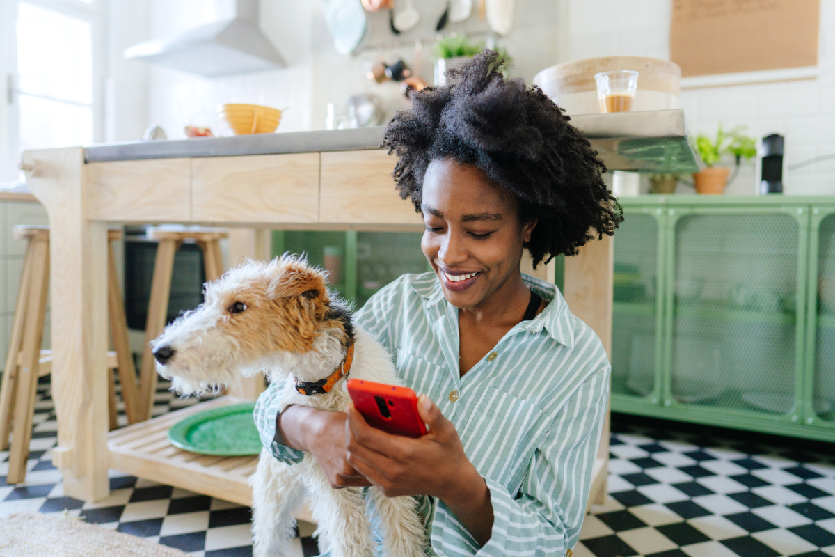A woman getting pre-approved for a mortgage on her phone.