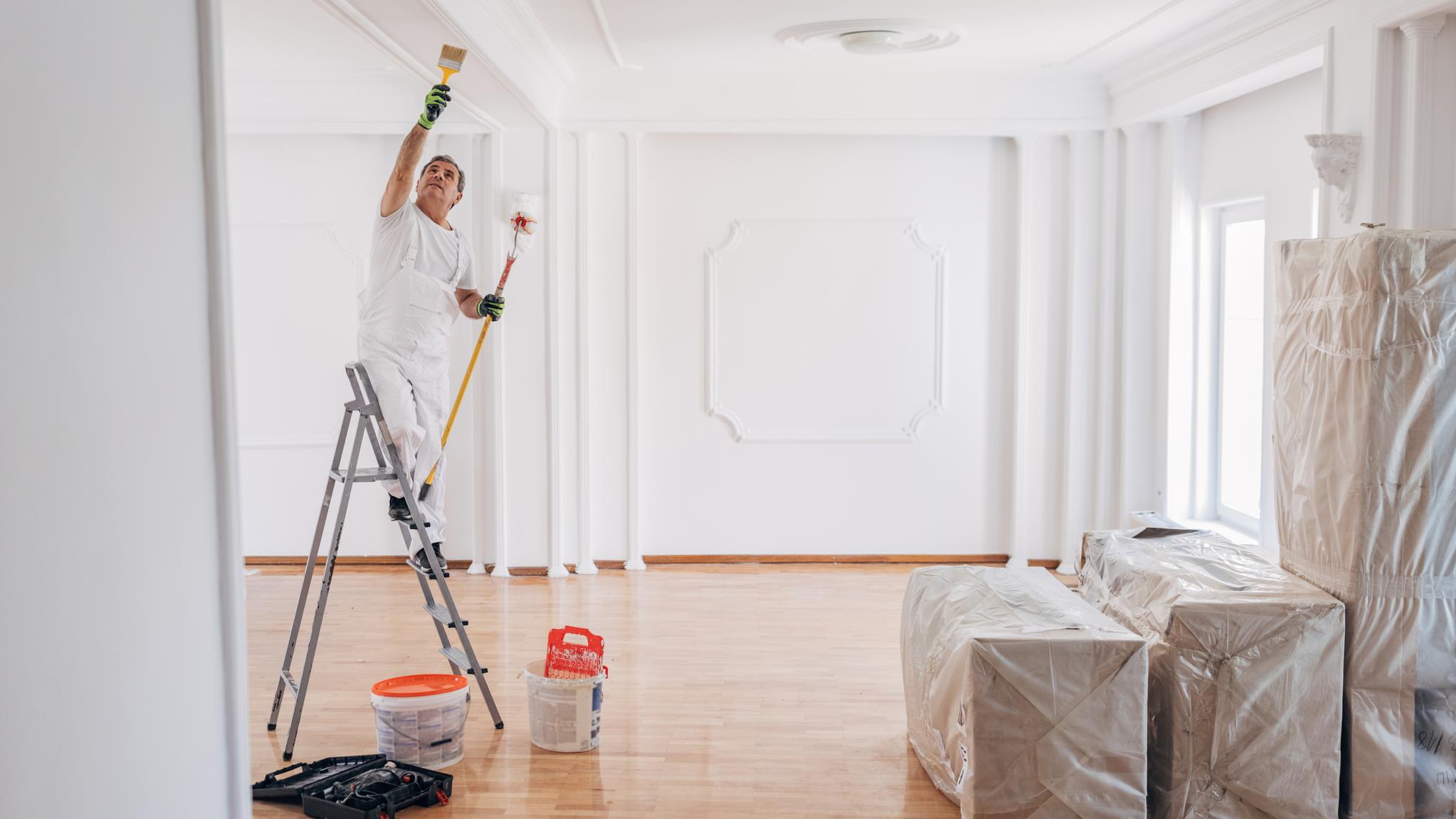 A picture of a landlord working on a rental.