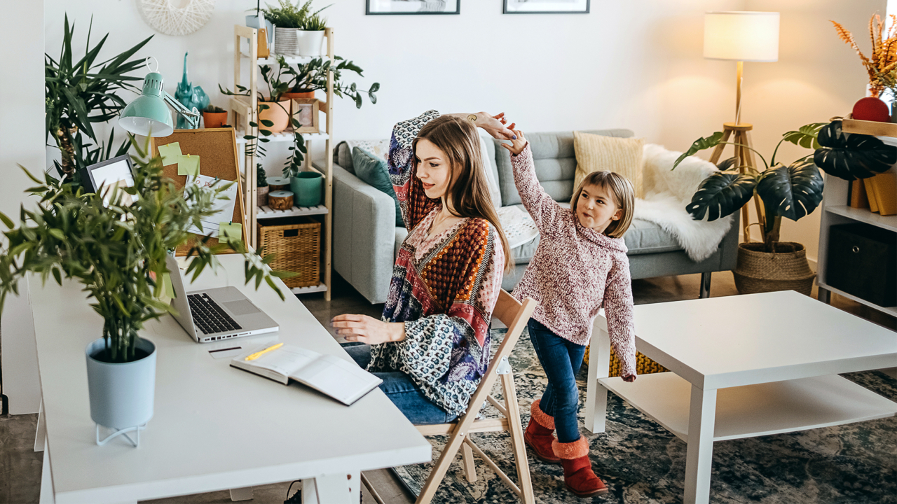 Woman researching the best time to buy a house