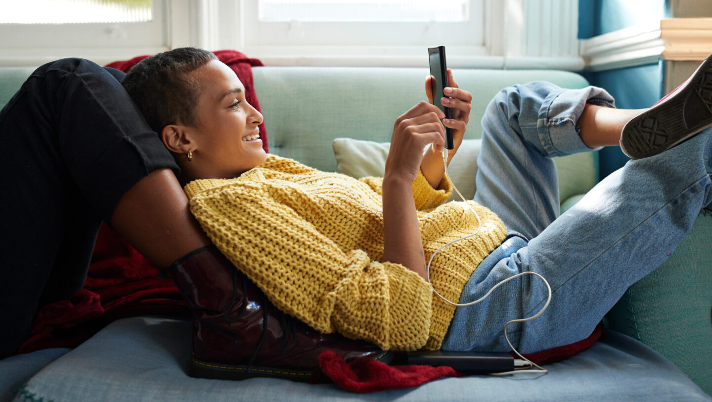 A woman on her cellphone learning how to get pre-qualified for a mortgage.