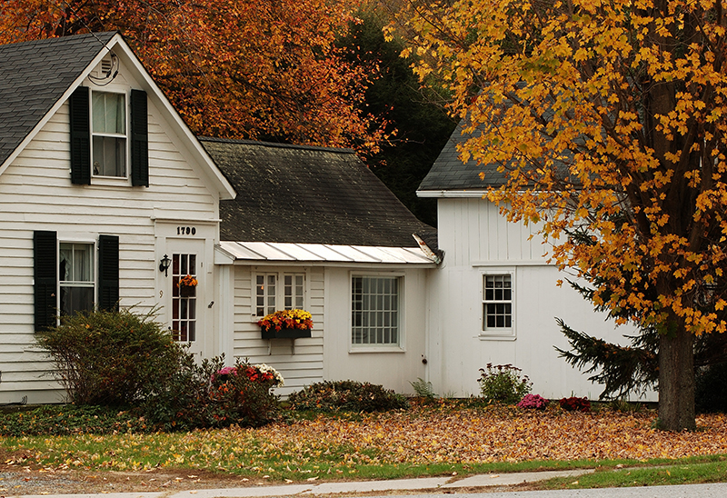 country home with fall foliage