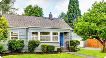 image of light blue house with blue door