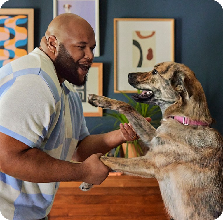 image of man smiling with dog