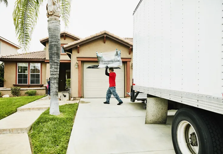 Moving truck and boxes illustrating moving cost considerations
