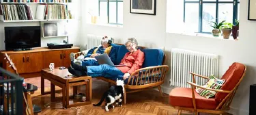 Grandparents spending quality time with grandchildren at home